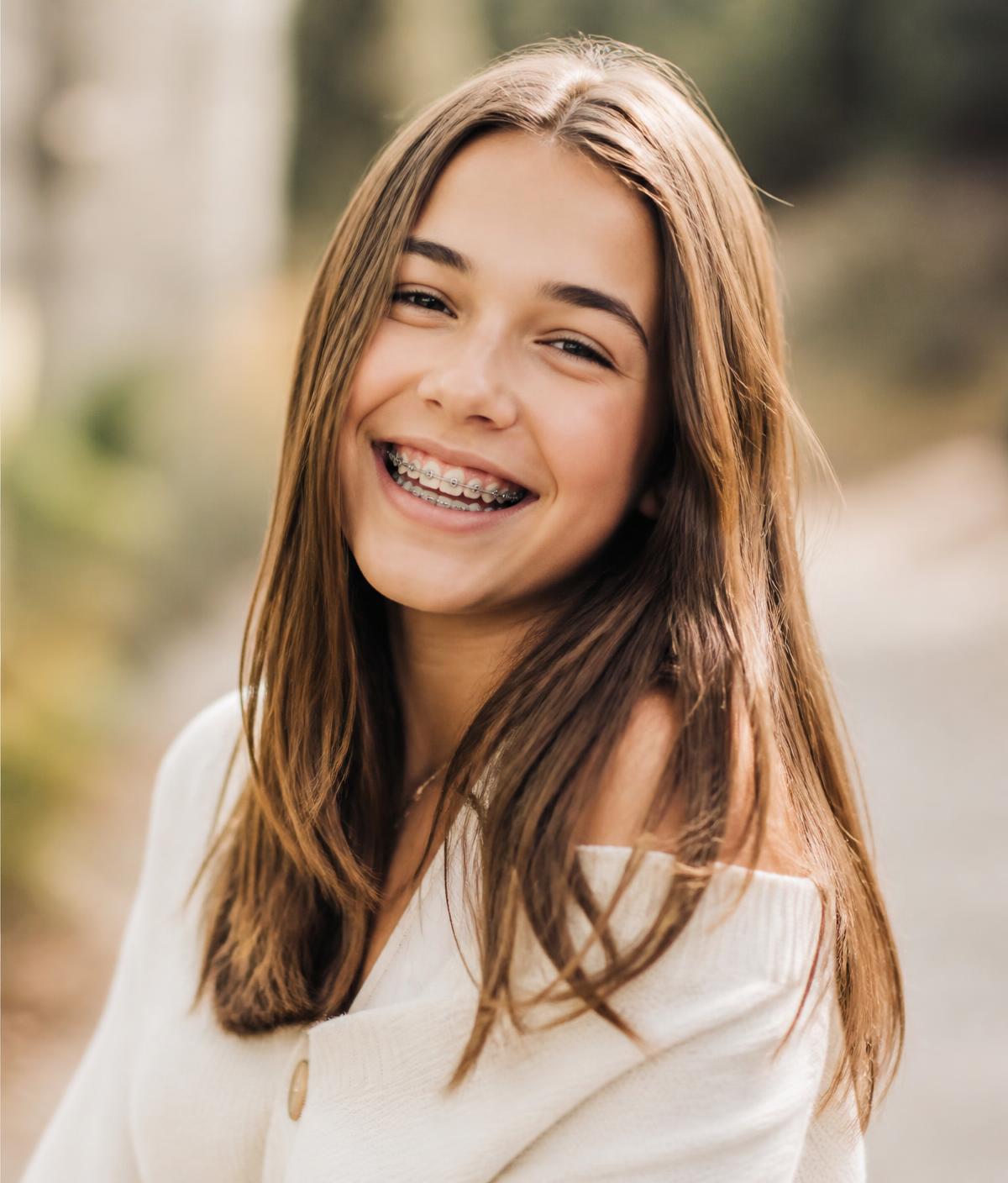 Smiling teen patient with braces